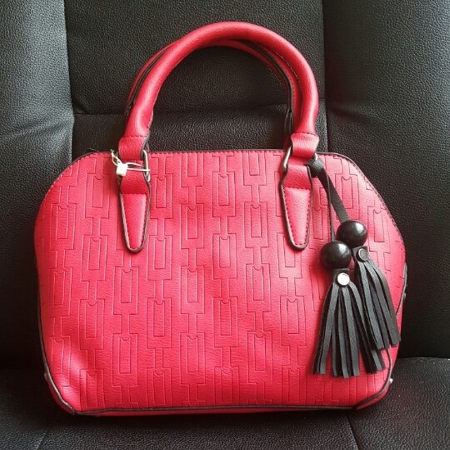 Túi xách thời trang hai hạt gỗ