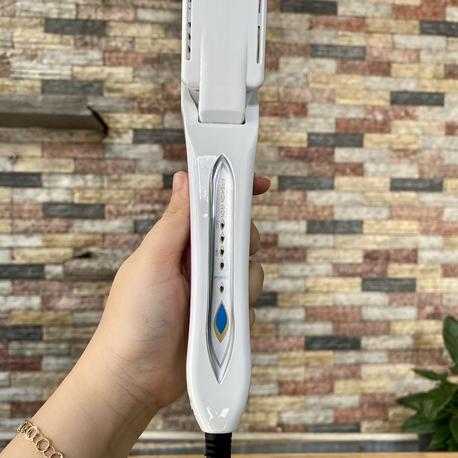 Máy duỗi tóc kemei KM 750