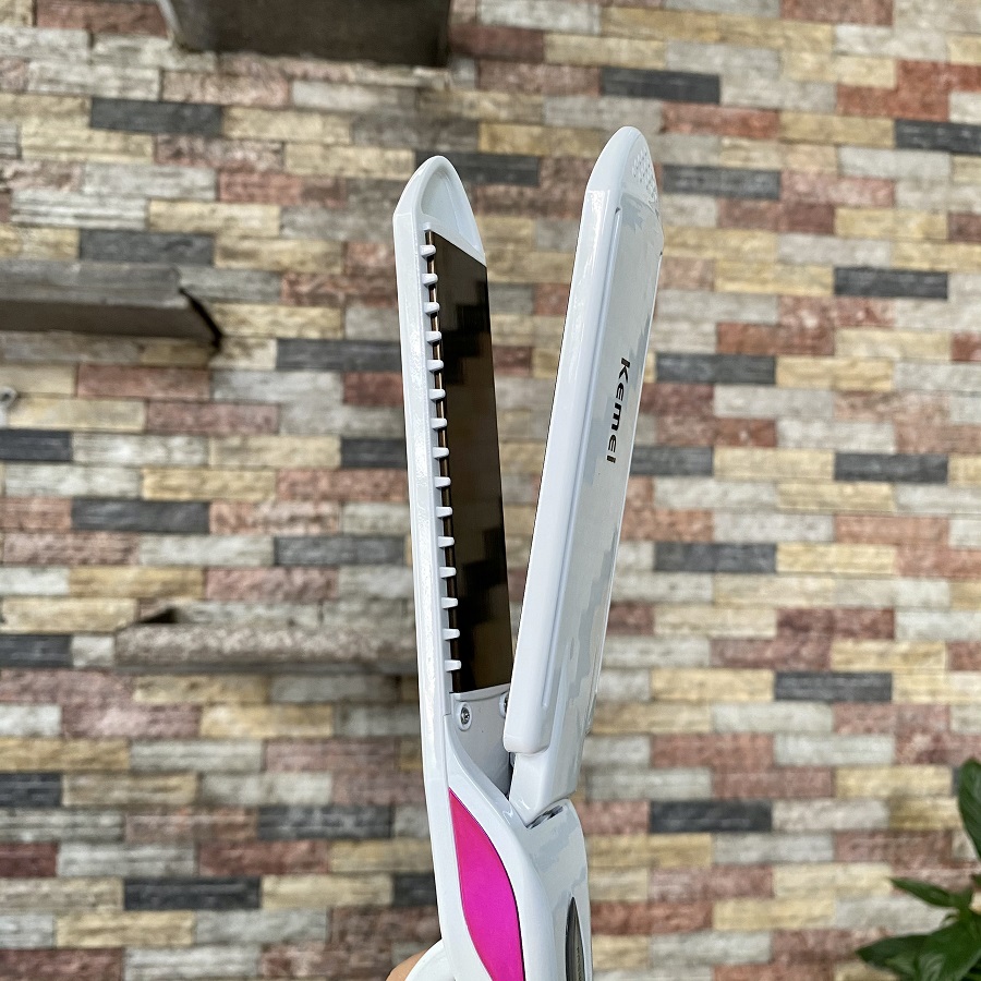 Máy duỗi tóc kemei KM 750