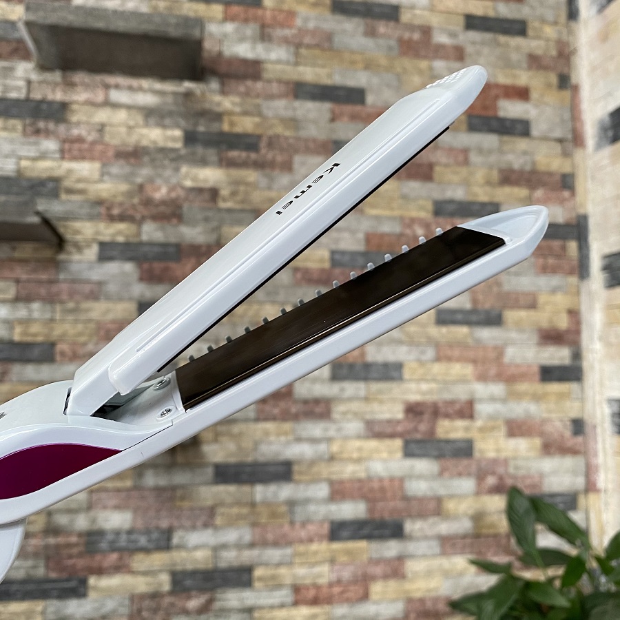 Máy duỗi tóc kemei KM 750