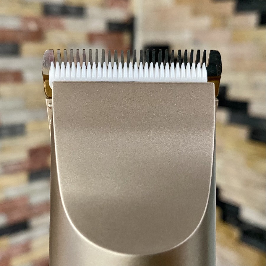 Tông đơ cắt tóc Kemei 3057 lưỡi sứ - Tặng kèm 2 pin