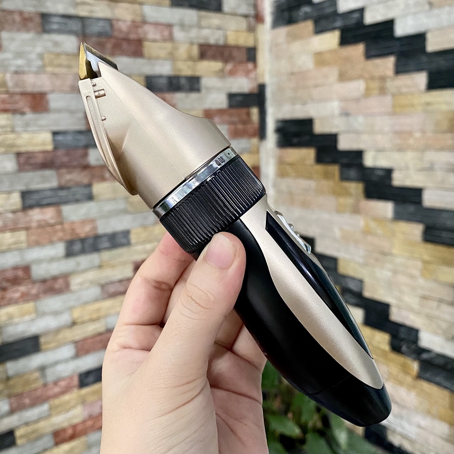 Tông đơ cắt tóc Kemei 3057 lưỡi sứ - Tặng kèm 2 pin