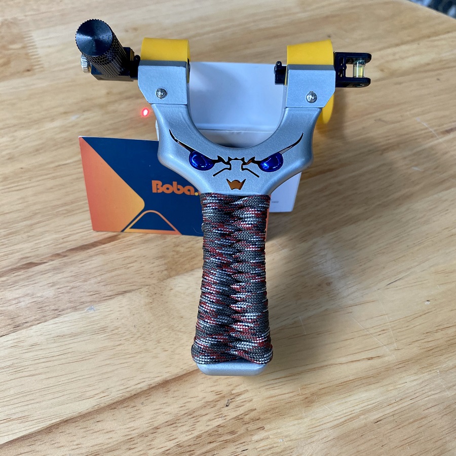 Bắn thun cao su mặt quỷ có ống ngắm laser