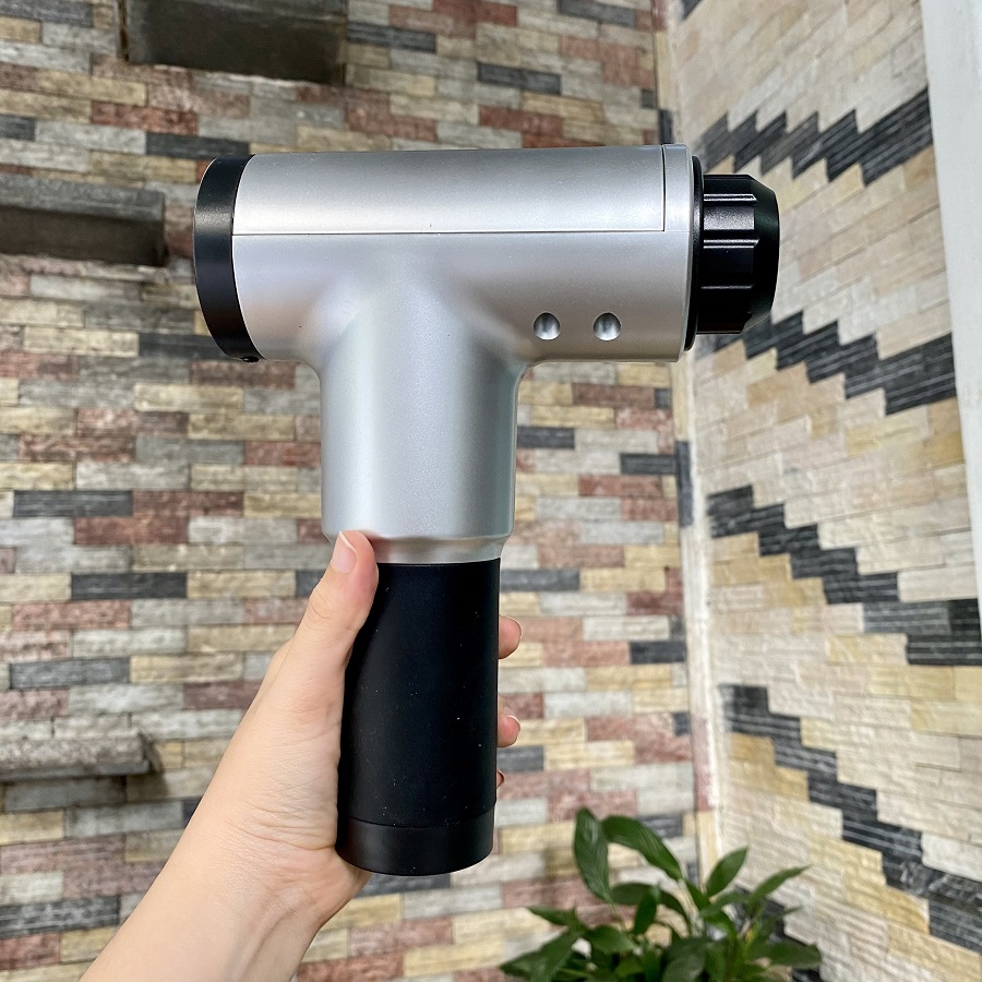máy massage cầm tay mini giãn cơ bắp fascial gun công nghệ Nhật Bản