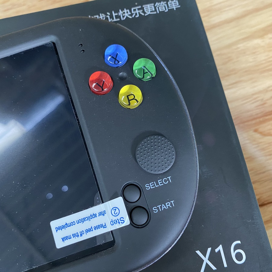 Máy chơi game cầm tay 4 nút PXP X16 màn hình 7 inch mới 99%