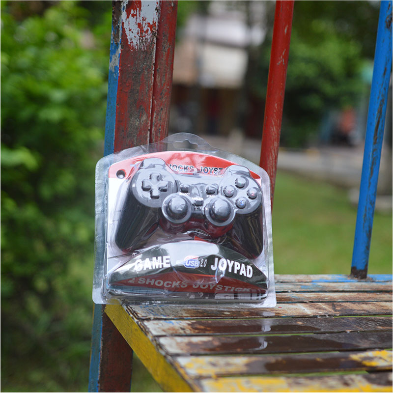 Tay gamepad đơn KM66 có rung ( Chỉ chơi trên PC)