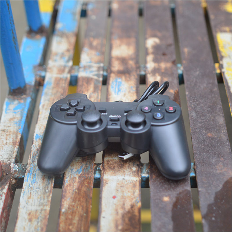 Tay gamepad đơn KM66 có rung ( Chỉ chơi trên PC)