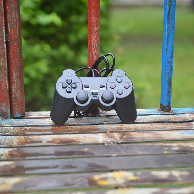 Tay gamepad đơn KM66 có rung ( Chỉ chơi trên PC)